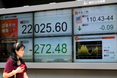 Stimulus, Brexit talks weigh on Asian markets
