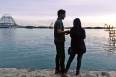 Aiming the lens at the lives of refugees stuck in Indonesia