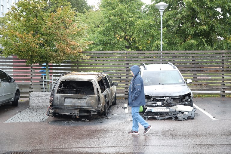 Masked vandals torch dozens of cars in Sweden