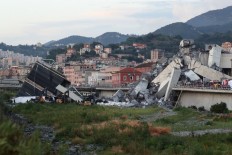 Floodlight search for survivors after deadly Italy bridge collapse