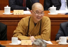 China investigates top Buddhist leader for sexual assault