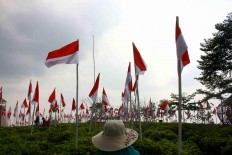 A total of 1,945 Indonesian flags are hoisted at the peak of Mount Cilik. JP/Maksum Nur Fauzan