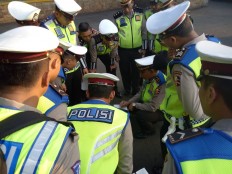 Police arrest four over distribution of demonstration exercise video