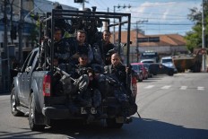 At least 13 killed in Rio security operations: Officials