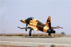 Iran unveils first domestic fighter jet