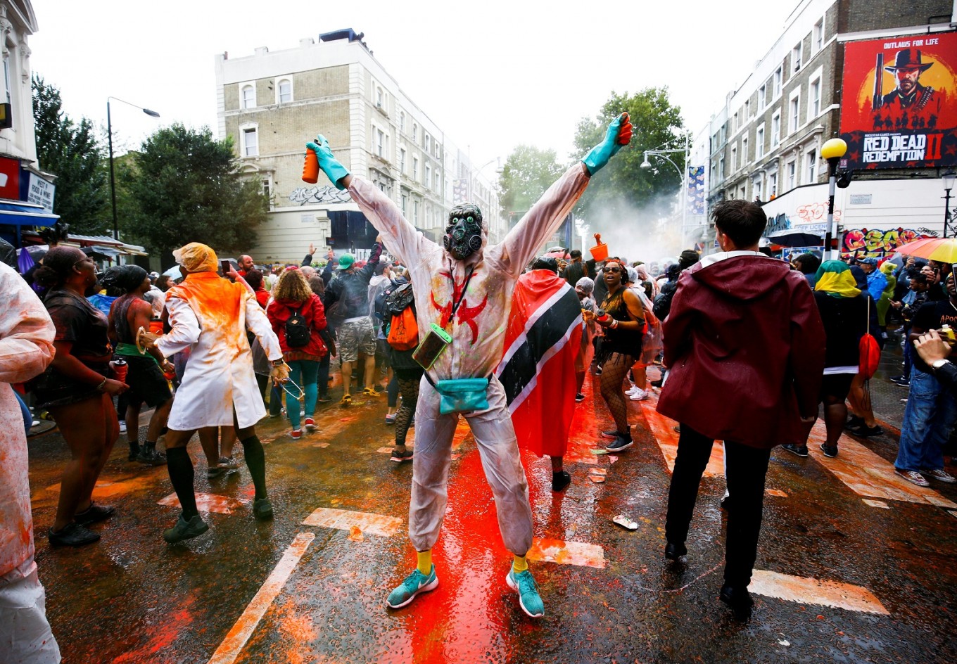 Notting Hill Carnival crowds defy London rain for annual celebration