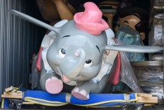 Dumbo flies off for $483,000 in $8.3m Disneyland auction
