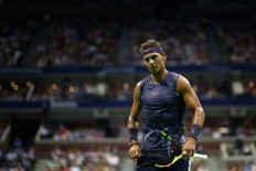 Nadal sends injured Ferrer into Grand Slam retirement