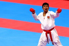 Victorious: Indonesia Karateka Rifki Ardiansyah Arrosyid reacts after winning the men's 60 kilogram kumite final against Mahdi Zadeh Amir from Iran in Jakarta. JP/ Seto Wardhana