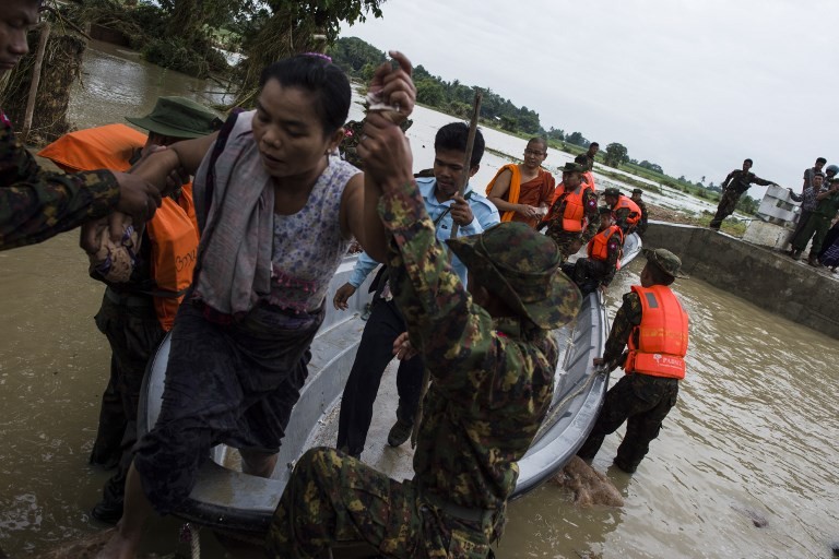 Rescuers struggle to reach stranded in Myanmar dam flooding