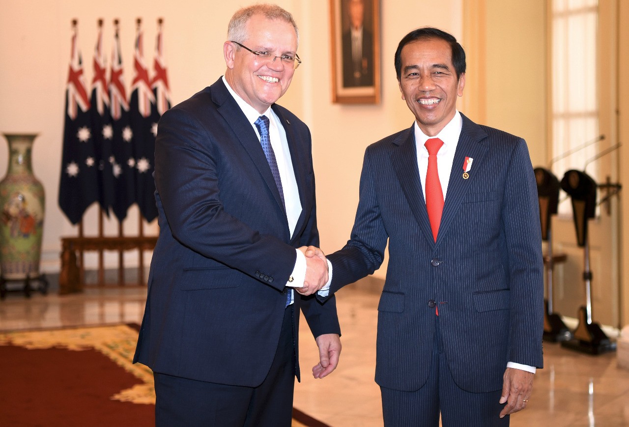 President Joko "Jokowi" Widodo (right) shakes hands with Australian Prime Minister Scott Morrison in Jakarta on Friday. Image: AFP/Sonny Tumbelaka