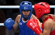 Asian Games: Huswatun earns host’s first boxing medal