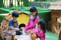 Furry friends: Children at the Padma Hotel Bandung pet and feed animals at the hotel&rsquo;s newly expanded Adventure Park playground. The playground, located on the hotel&rsquo;s eighth floor, is a complimentary facility for hotel guests only and open daily from 8 a.m. to 5:30 p.m.