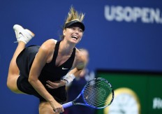 Sharapova closes out Cirstea to advance at US Open