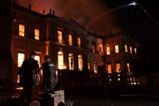 Raging fire tears through prized Rio museum