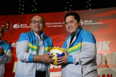 Dependable: Workers Social Security Agency (BPJS Ketenagakerjaan) president director Agus Susanto (left) poses for a photograph with Indonesian Asian Games Organizing Committee president Erick Thohir. BPJS Ketenagakerjaan was one of the insurance partners for Indonesian athletes competing in the 2018 Asian Games, held from Aug. 18 to Sept. 2 in Jakarta and Palembang, South Sumatra. 