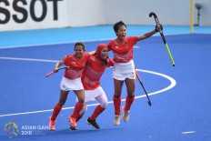 Indonesia players celebrate after a goal during the women's hockey match between Indonesia and Kazakhstan at the 2018 Asian Games in Jakarta on August.23. Inasgoc via Antara/Dhoni Setiawan
