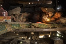 Getting high in Laos' opium-riddled mountains