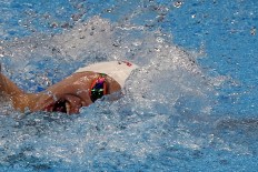 China's Sun Yang swims in men’s 800-meter freestyle. He won the gold after finishing in 7:48.36, breaking the Asian Games record. JP/Seto Wardhana