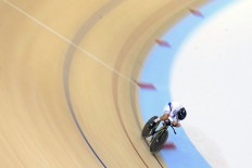 South Korea's Park Sang-hoon races during cycling track men’s 4,000-meter individual pursuit. Park won the gold and broke the Asian Games record with a final time of 4:19,672. JP/Seto Wardhana