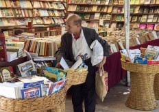 A customer browses books at a bookshop in the Moroccan capital Rabat on August 9, 2018.
