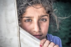 Photo exhibition sheds light on refugee crisis