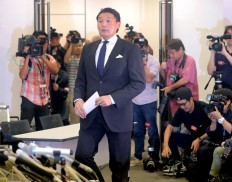 Sumo boss Takanohana resigns over assault row