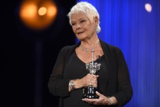 Dench says 'can't approve' of cutting Spacey from Hollywood film
