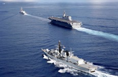 Japanese carrier drills with British warship heading to contested South China Sea