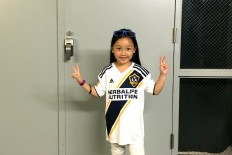 Malea Emma Tjandrawidjaja won a social media contest to sing "The Star Spangled Banner" at a Major League Soccer (MLS) game.