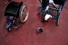 Wheelchair fencing equipment lies on the floor during a training session. JP/Maksum Nur Fauzan