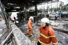 Car catches fire on Semanggi inner ring road