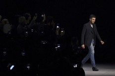 Slimane back in black as king of Paris fashion week