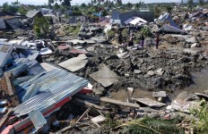 Quake-triggered mudflow flattens Palu villages, thousands feared dead