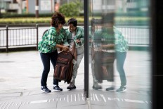 Two dead after typhoon batters Japan