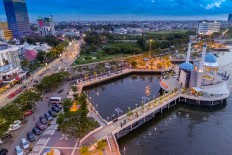 Aerial view of Amirul Mukminin Floating Mosque, a landmark in Losari Beach, South Sulawesi. 