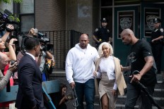 Cardi B charged with assault, endangerment over strip-club brawl