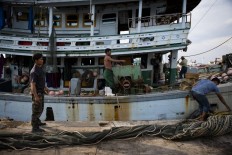 Extortion and abuse: Myanmar workers arrive debt-laden in Thailand