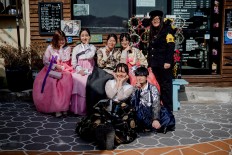 South Korean students dressed in hanbok spend time in Gamcheon. JP/Anggara Mahendra