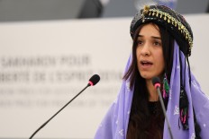Nadia Murad, public advocate for the Yazidi community in Iraq and survivor of sexual enslavement by the Islamic State jihadists, delivers a speech after being awarded co-laureate of the 2016 Sakharov human rights prize at the European parliament in Strasbourg.