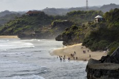 The picturesque Indrayanti Beach in Gunungkidul, Yogyakarta.
