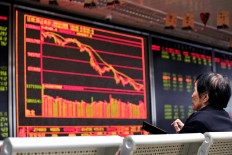 IMF lowers China 2019 growth forecast, citing trade war