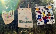 Handmade keepsakes made in memory of deceased babies hang from a wire during a memorial ceremony held on October 6, 2018 in Madrid, ahead of the international pregnancy and infant loss awareness day. 