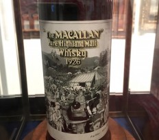 The Macallan 1926, a 60-year-old whisky, with a label by artist Sir Peter Blake, is on display at Sotheby's in New york, on October 12, 2018. The bottle is to be auctioned on October 13 and is expected to fetch $700,000 to $1.2 million, possibly making it the world's priciest whisky.