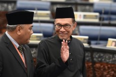 Anwar: Non-Muslims' right to drink, MB's right to resign golf club presidency