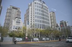 Ex-chief of China asset management firm prosecuted for graft