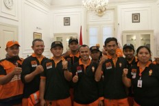 Jakarta&rsquo;s 'orange troops' collect Rp 26 million for Central Sulawesi relief