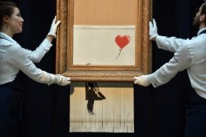 Partially shredded Banksy canvas to go on view in Germany