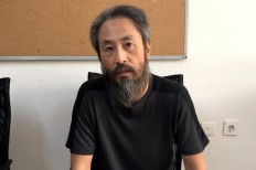 Freed Japanese journalist says Syria kidnap ordeal was 'hell'
