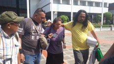 Dozens gather in Lion Air crash crisis center to report on family members